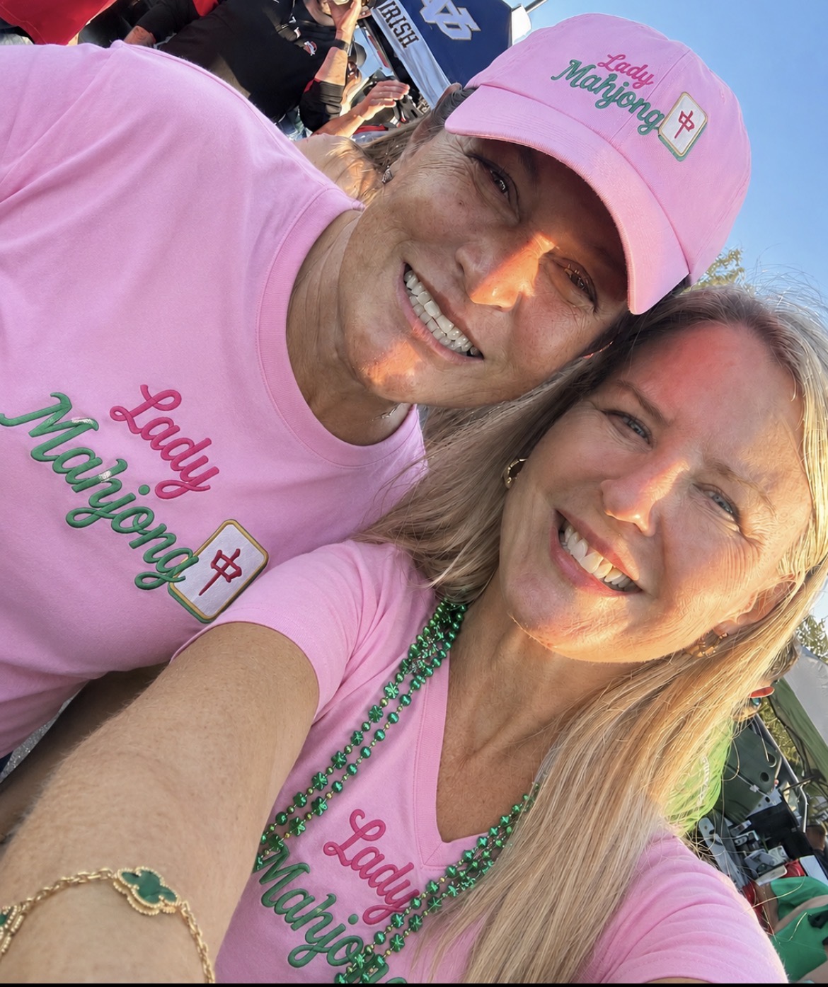 Josie and Catherine wearing pink mahjong gear